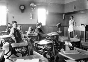 interior of Marsh school with students and teacher