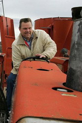 Senator Jon Tester working on his farm.