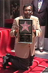 Pride with his Walk of Fame star, charleypride.com
