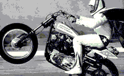 Evel Knievel 'popping a wheelie.'