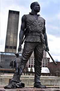 This statue honoring York stands in Belvedere/Riverfront Plaza in Louisville, Kentucky.  It was created by Ed Hamilton and dedicated in October 2003.
Photo: Creative Commons/Don Sniegowski