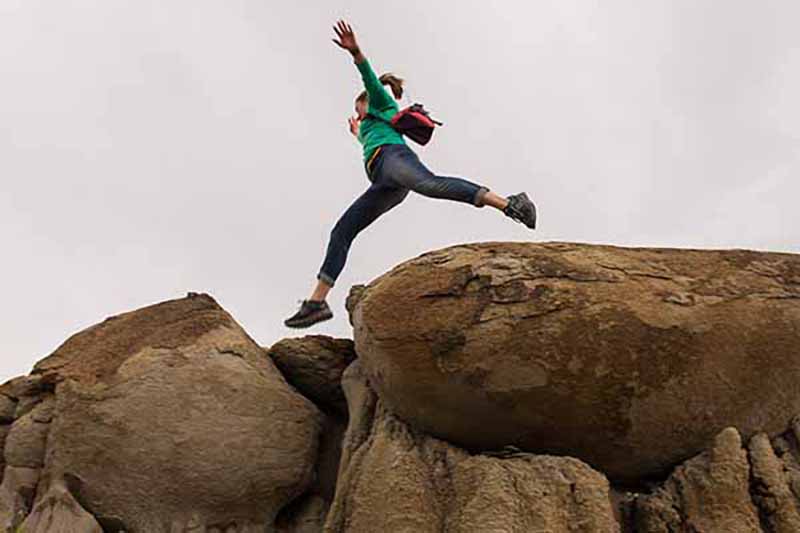 A girl leaping in the air.